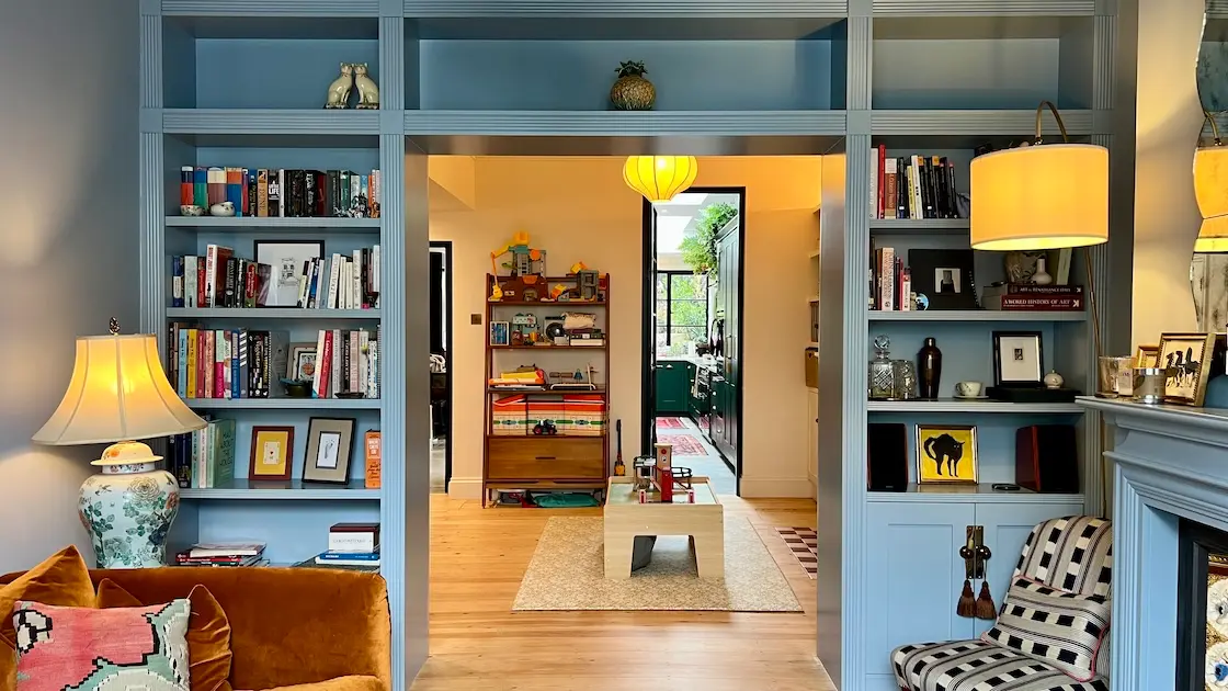 bespoke-made fitted bookcases around the passage