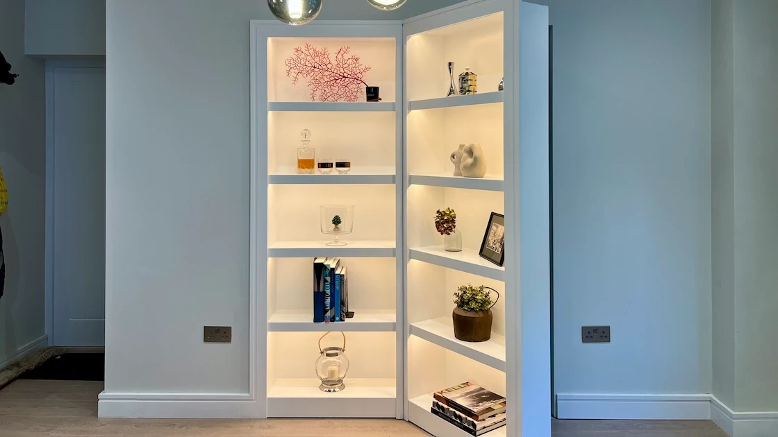 Illuminated white shelving unit display