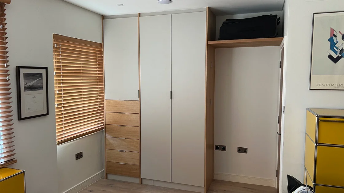 bedroom fitted wardrobe with shelves and drawers